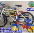 Fotos de Agentes da Guarda Municipal de Sarandi se unem e presenteiam criança com bicicleta e festa de aniversário