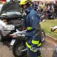 Fotos de Câmera flagra acidente entre carro e moto onde mulher ficou com o pé preso no parachoque