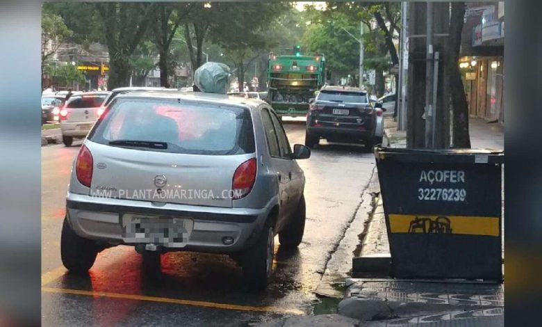 Fotos de Maringá; motorista mal-educado, tem lixo deixado sobre seu veículo, estacionado irregular em frente a lixeira